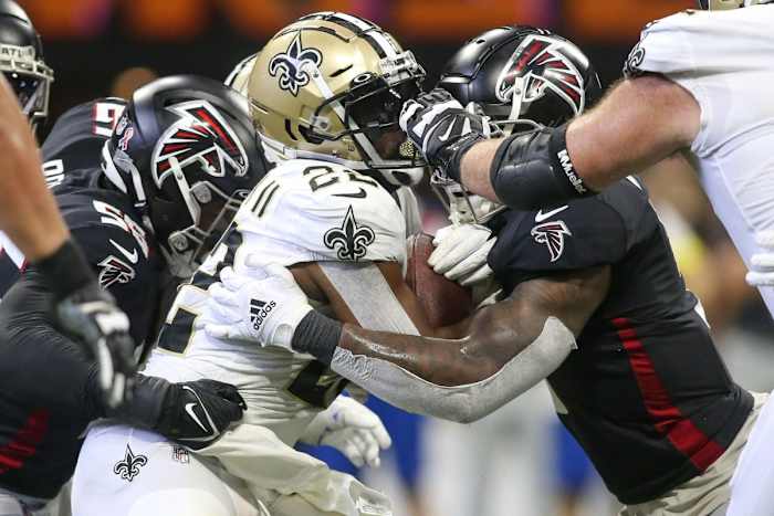 New Orleans Saints running back Mark Ingram II (22) is tackled by Atlanta Falcons linebacker Mykal Walker (3). Mandatory Credit: Brett Davis-USA TODAY Sports